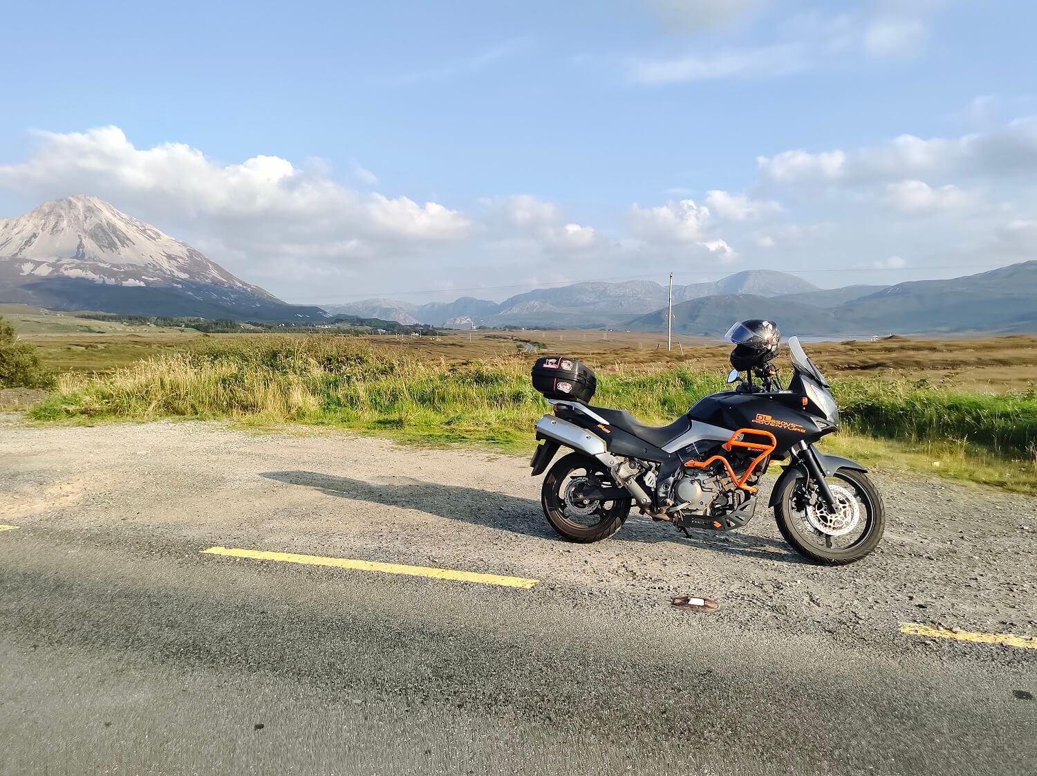 Vstrom 650 motorcycle with Errigal mountain, Donegal in the backgound