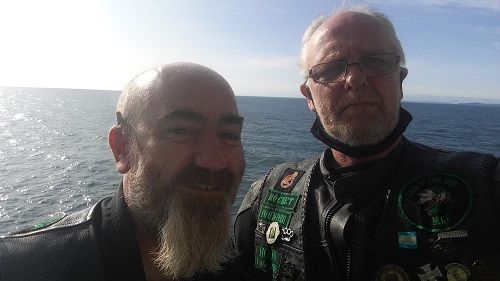 Selfie of Taco and Rocket on Ferry with sea in the background